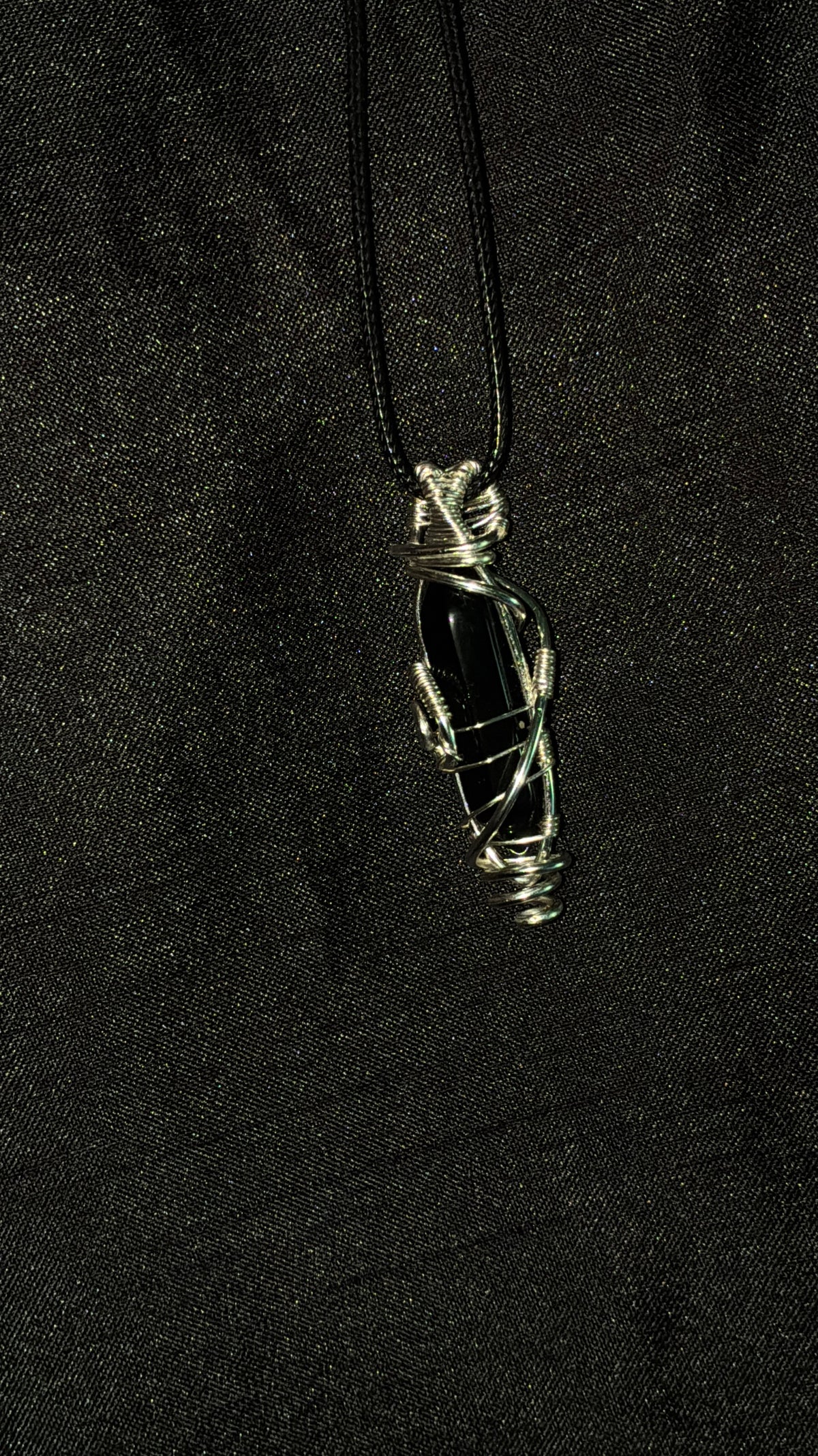 Silver wrapped crystal pendants