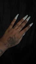 Spiral top ring