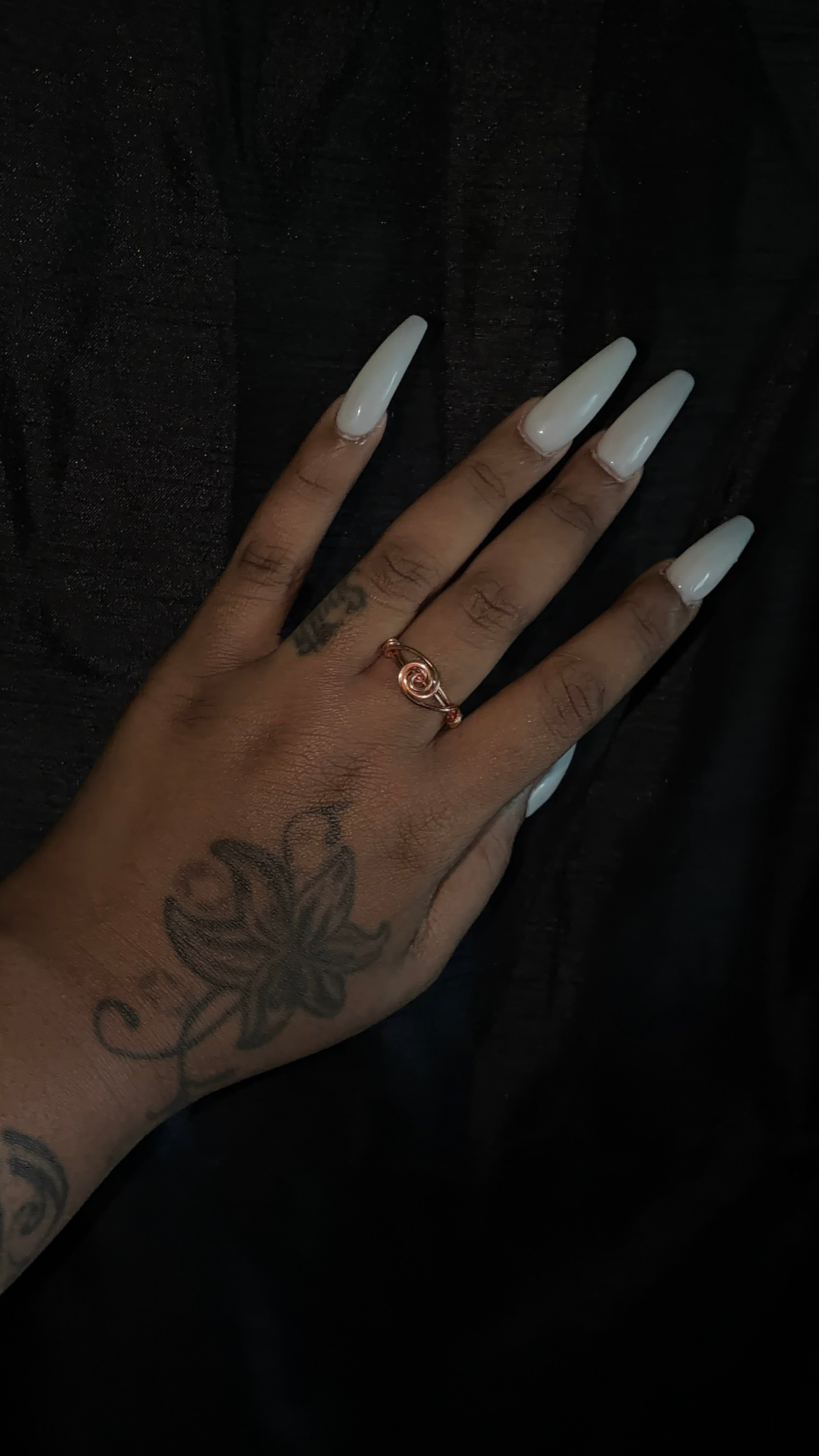 Spiral top ring