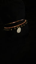 2 piece Dainty copper bangles with bells and cowrie shell