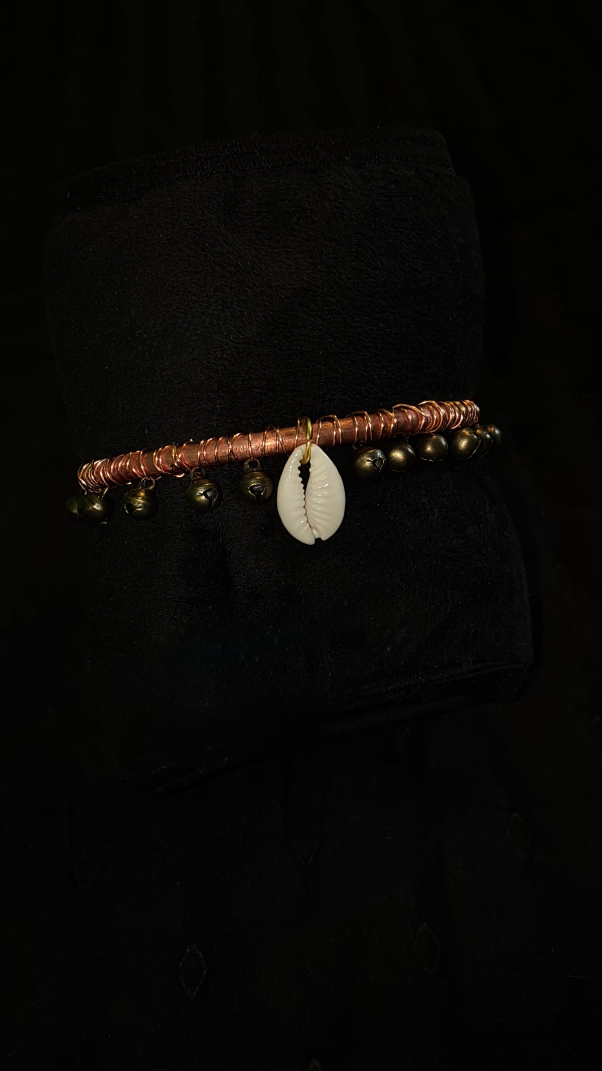 Chunky bangle with bells and cowrie shell